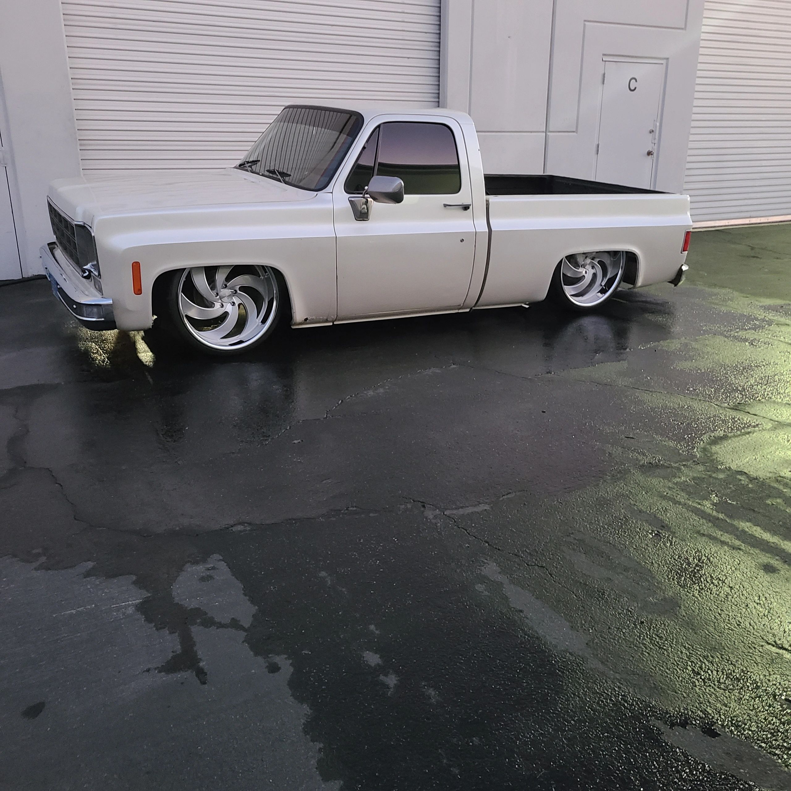 White bagged C10 truck custom build Ikon Industries